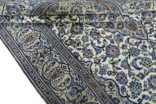 Close-up detail of 2000s Kashan rug from Iran / Persia showing Wool weave