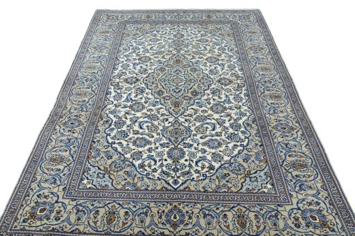 Surface texture of 2000s Kashan rug with natural Wool and intricate pattern