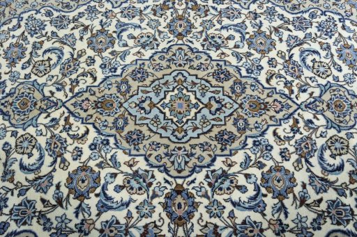 Central medallion detail of 2000s Kashan rug from Iran / Persia