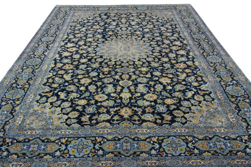 Surface texture of 2000s Kashan rug with natural Wool and intricate pattern