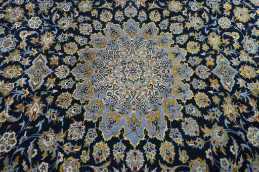 Central medallion detail of 2000s Kashan rug from Iran / Persia