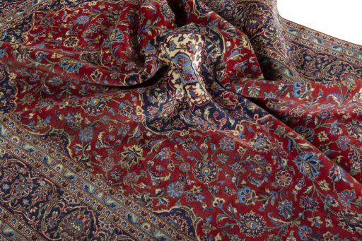 Surface texture of 2000s Kashan rug with natural Cork and intricate pattern