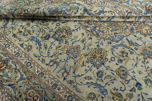 Close-up detail of 2000s Kashan rug from Iran / Persia showing Wool weave