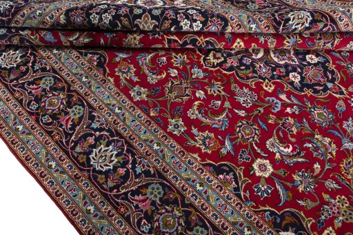 Close-up detail of 2000s Kashan rug from Iran / Persia showing Wool weave