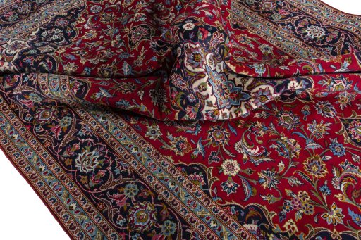 Surface texture of 2000s Kashan rug with natural Wool and intricate pattern