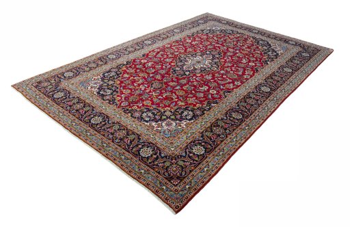 Corner detail of 2000s Kashan rug showing border pattern and Wool pile