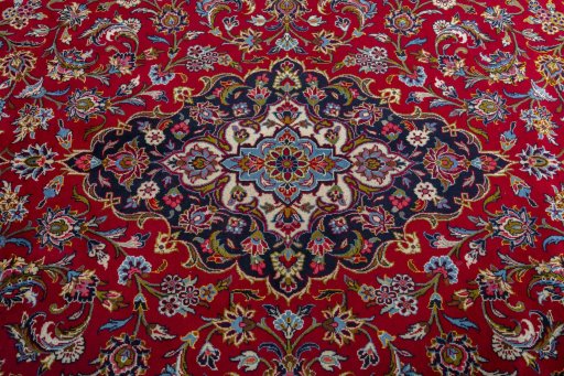 Central medallion detail of 2000s Kashan rug from Iran / Persia