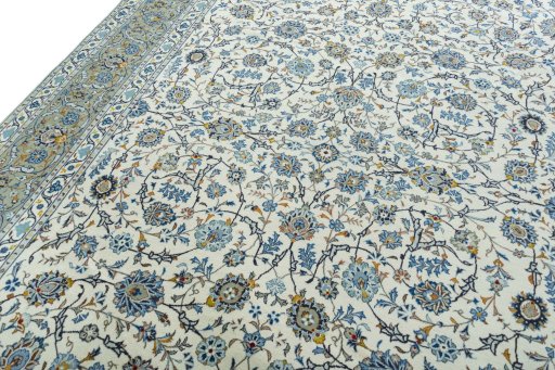 Backside of handmade 2000s Kashan rug showing knot structure and weave density