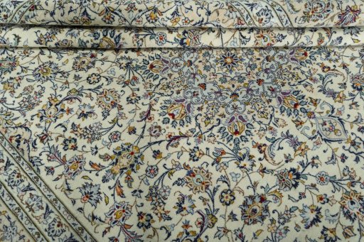 Close-up detail of 2000s Kashan rug from Iran / Persia showing Cork weave