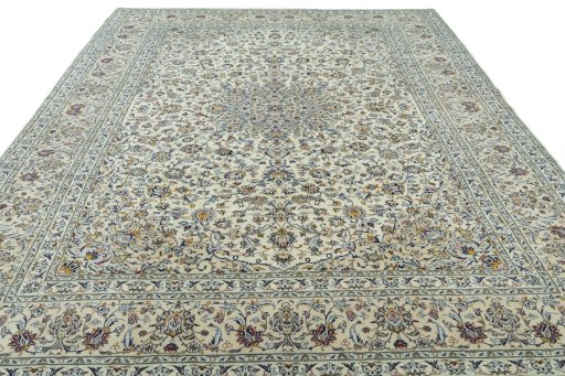 Surface texture of 2000s Kashan rug with natural Cork and intricate pattern