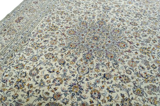 Backside of handmade 2000s Kashan rug showing knot structure and weave density