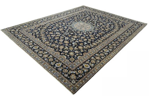 Corner detail of 2000s Kashan rug showing border pattern and Wool pile