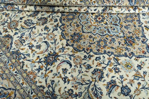 Close-up detail of 2000s Kashan rug from Iran / Persia showing Wool weave