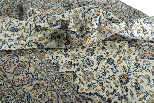 Surface texture of 2000s Kashan rug with natural Wool and intricate pattern