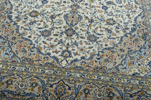 Close-up detail of 2000s Kashan rug from Iran / Persia showing Wool weave