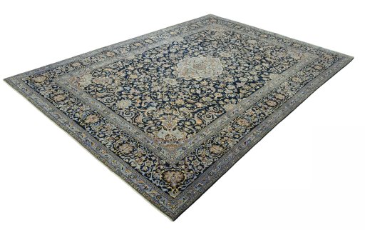 Corner detail of 2000s Kashan rug showing border pattern and Wool pile