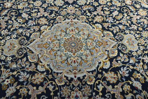 Central medallion detail of 2000s Kashan rug from Iran / Persia