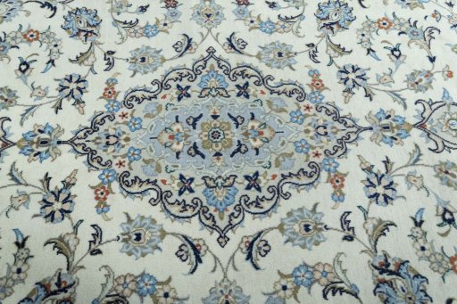 Central medallion detail of 2000s Kashan rug from Iran / Persia