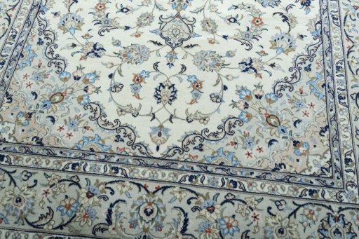 Close-up detail of 2000s Kashan rug from Iran / Persia showing Wool weave
