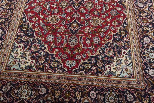 Close-up detail of 2000s Kashan rug from Iran / Persia showing Wool weave