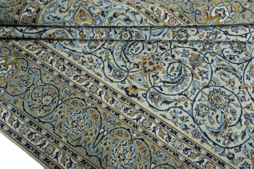 Close-up detail of 2000s Kashan rug from Iran / Persia showing Wool weave