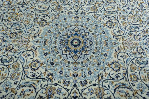 Central medallion detail of 2000s Kashan rug from Iran / Persia