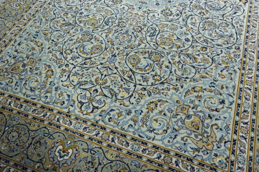 Close-up detail of 2000s Kashan rug from Iran / Persia showing Wool weave