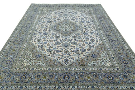 Surface texture of 2000s Kashan rug with natural Cork and intricate pattern