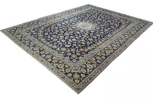 Corner detail of 2000s Kashan rug showing border pattern and Wool pile