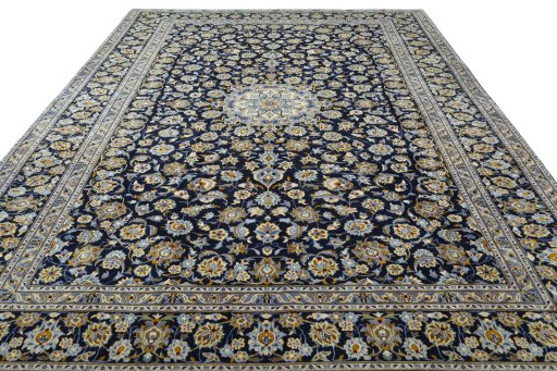 Surface texture of 2000s Kashan rug with natural Wool and intricate pattern