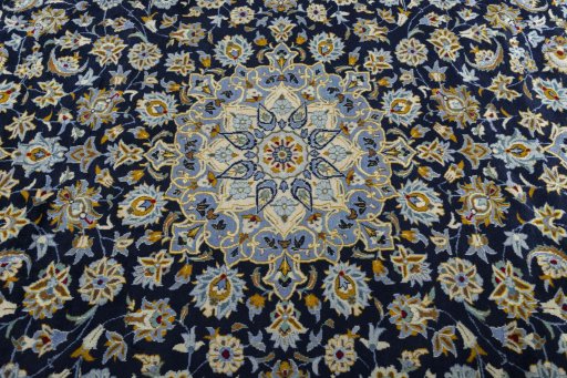 Central medallion detail of 2000s Kashan rug from Iran / Persia