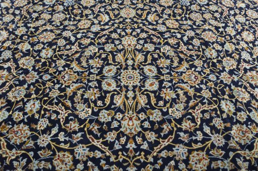 Central medallion detail of 2000s Kashan rug from Iran / Persia