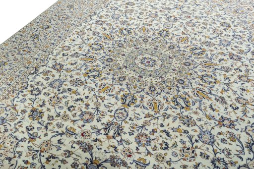Backside of handmade 2000s Kashan rug showing knot structure and weave density