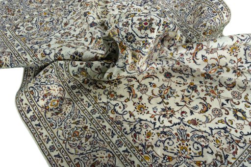 Surface texture of 2000s Kashan rug with natural Wool and intricate pattern