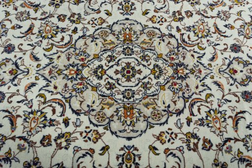 Central medallion detail of 2000s Kashan rug from Iran / Persia