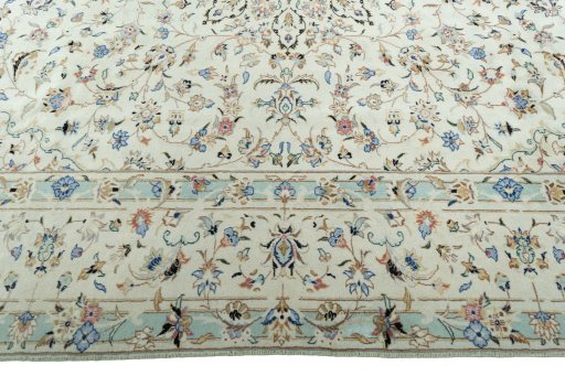 Corner detail of New Kashan rug showing border pattern and Wool pile