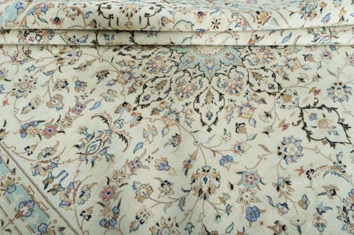 Close-up detail of New Kashan rug from Iran / Persia showing Wool weave