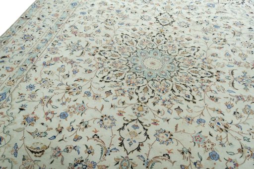 Backside of handmade New Kashan rug showing knot structure and weave density