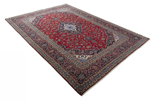 Close-up detail of 2000s Kashan rug from Iran / Persia showing Wool weave