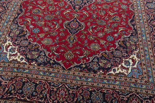 Close-up detail of 2000s Kashan rug from Iran / Persia showing Wool weave