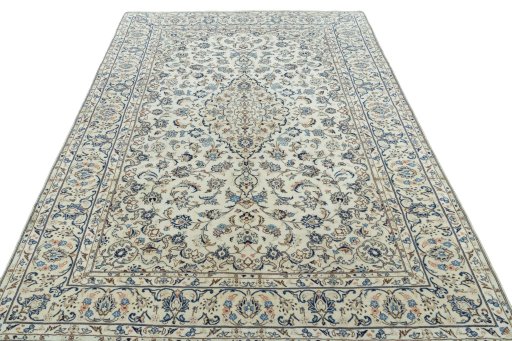 Surface texture of 2000s Kashan rug with natural Wool and intricate pattern