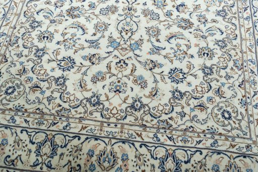 Close-up detail of 2000s Kashan rug from Iran / Persia showing Wool weave