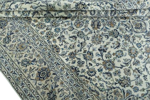 Close-up detail of 2000s Kashan rug from Iran / Persia showing Wool weave