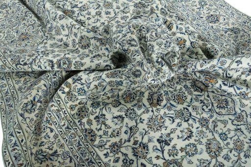 Surface texture of 2000s Kashan rug with natural Wool and intricate pattern