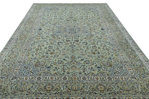Surface texture of 2000s Kashan rug with natural Wool and intricate pattern