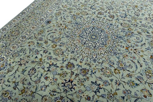 Backside of handmade 2000s Kashan rug showing knot structure and weave density