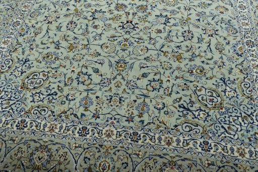 Close-up detail of 2000s Kashan rug from Iran / Persia showing Wool weave