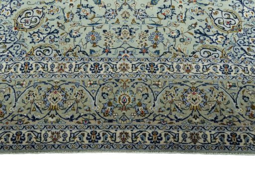 Full view of 2000s Kashan rug from Iran / Persia, 394 × 265 cm in Green tones