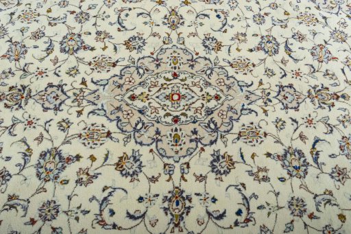 Central medallion detail of 2000s Kashan rug from Iran / Persia
