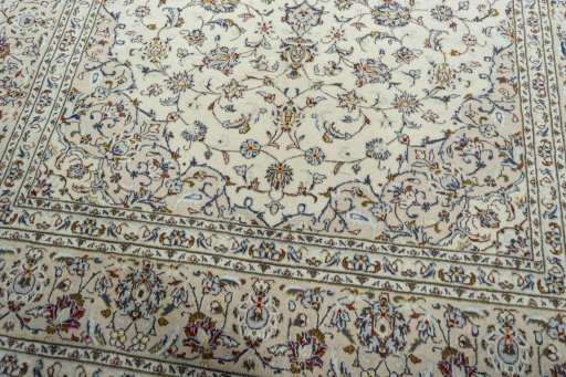 Close-up detail of 2000s Kashan rug from Iran / Persia showing Wool weave